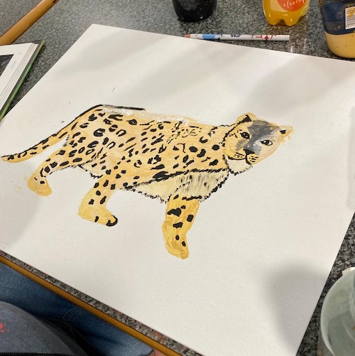 art club, a cheetah drawing on paper
